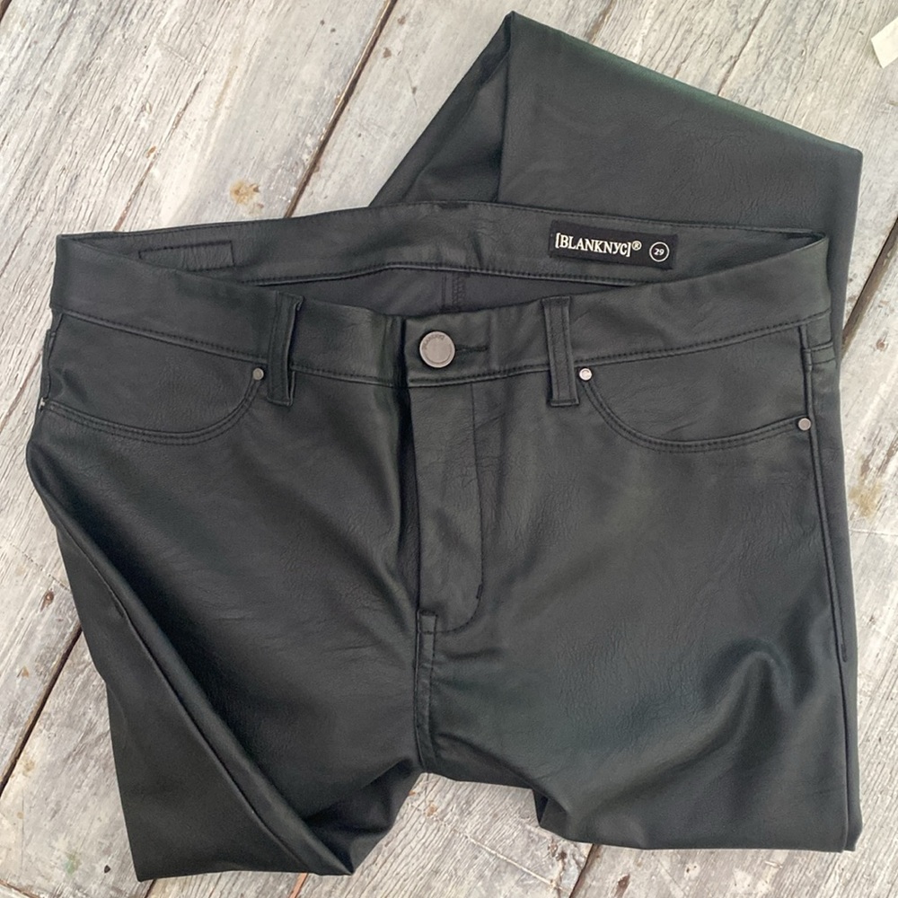 faux leather pants, two back pockets, faux front pockets.